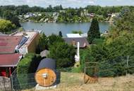 Traumhaftes Einfamilienhaus mit Garten und Sauna mit Seeblick auf Pachtgrund – Ihr neues Zuhause!