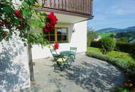 Helle 3 Zimmer Wohnung mit großzügiger Terrasse und Blick auf den Mondsee für Gartenliebhaber