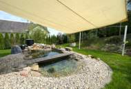 Ihr kleines Wohnparadies: Neuwertiger Bungalow mit Garten und Carport
