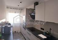 Familienwohnung mit 4 Zimmern im Zentrum mit großer Terrasse / eigene Garage - generalsaniert!