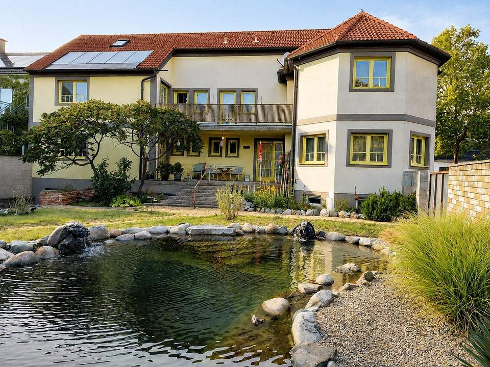 Podersdorf- Zweifamilienhaus mit Lagerhalle und Garten- viel Platz für alle!