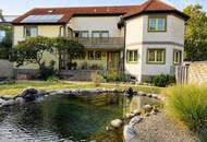 Podersdorf- Zweifamilienhaus mit Lagerhalle und Garten- viel Platz für alle!