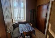 Sanierungsbedürftige 2-Zimmer-Eigentumswohnung mit Garten