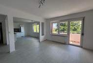 Vermietete Anlegerwohnung mit Balkon und moderner Küche in zentraler Lage