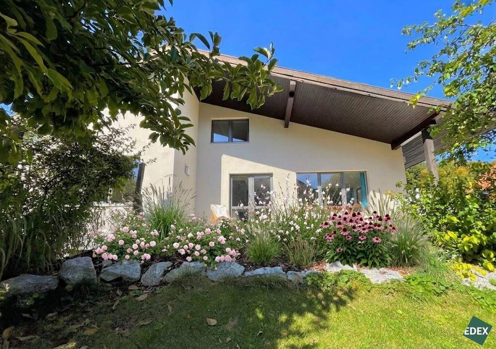 Charmantes Einfamilienhaus mit Kamin, Südterrasse und Garten in ruhiger Wohnlage
