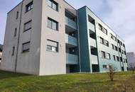 Zentrale Ruhelage – helle 3-Zimmer-Wohnung mit Loggia & Carport