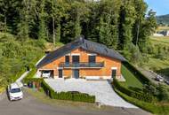 Herausragendes Mehrfamilienhaus im steirischen Thermen - und Vulkanland – stilvolles Wohnen in Aussichtslage