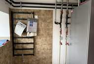 Wohnhaus mit 2 Einheiten, großer 2-stöckiger Garage und gemütlichem Garten