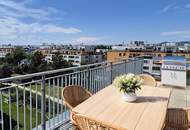 Neuwertige 2-Zimmer-Wohnung mit 19m² Dachterrasse und Fernblick