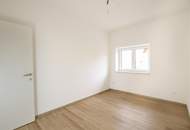 Top Lage: Moderne private Gartenwohnung - Erstbezug