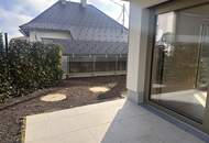 Moderne Gartenwohnung mit Charme und Bergblick