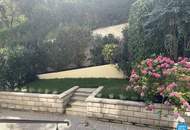Erstbezug: Elegante Gartenwohnung mit Outdoor Pool