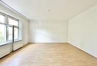 Brigittaplatz | Bezaubernde 2 Zimmer Altbau mit Potenzial &amp; Grünblick für unter € 3.650/m2