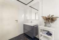 Wohnen über den Dächern von Graz mit Blick auf den Schlossberg: Exklusive Stadtwohnung mit Terrasse