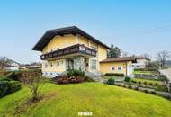 Stilvolles Ein- Zweifamilienhaus mit Doppelgarage und großen Garten