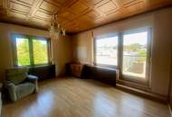 Gepflegtes Einfamilienhaus mit großer Terrasse und vielen Garagen!