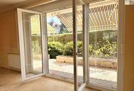 4-Zimmer-Terrassenwohnung mit ca. 100m² Garten und TG Stellplatz
