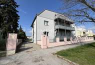 Miethaus mit 9 Wohnungen, Gemeinschaftsgarten und Carports