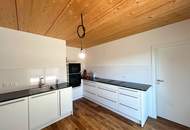 Moderne Gartenwohnung mit großzügigen Terrassen in sonniger Ruhelage