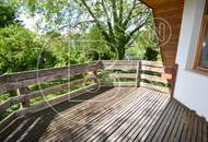 Einfamilienhaus in zentraler Bestlage mit Tennisplatz auf parkähnlichem Grund!