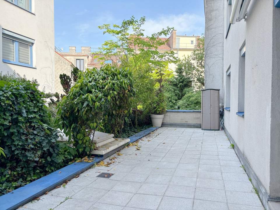Stadtleben im Grünen – Stilvolle Wohnung mit Terrasse und Garten