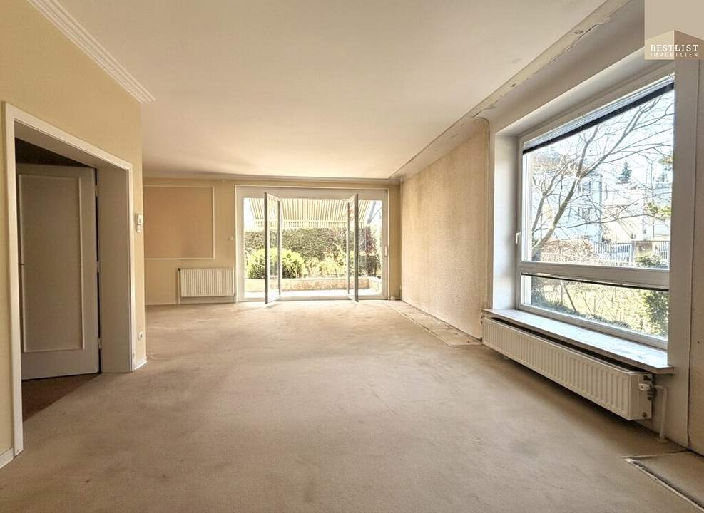 4-Zimmer-Terrassenwohnung mit ca. 100m² Garten und TG Stellplatz