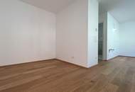 Erstbezug – 2-Zimmer-Charakter-Wohnung mit Loggia, Luft-Wärmepumpe & PV-Anlage