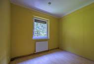 Mehrfamilienhaus mit Park