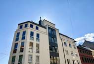 LUXURIÖSE DG-WOHNUNG MIT GROSSER TERRASSE UND KLIMAANLAGE NÄHE POSTSPORTPLATZ