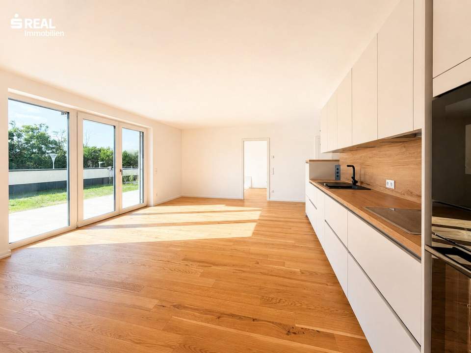 Erstbezug: elegante 3 Zimmer-Gartenwohnung mit moderner Küche