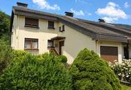 Charmantes Reihenhaus in ruhiger Wohnlage mit 118,70 m² Wohnfläche, voll unterkellert, incl. Garage und traumhaftem Bergblick