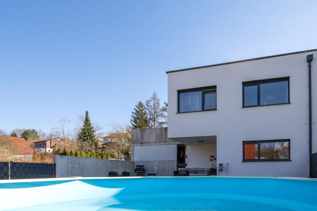 Modernes Wohnen über zwei Etagen - voll möbliert mit zwei Terrassen und Garten in TOP LAGE!