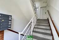Schöne DG-Wohnung in ruhiger Lage mit hochwertiger Küche & langem Balkon