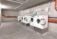 Neubauwohnung mit Süd-Balkon in ruhigen Innenhof und Garage | Einbauküche | U-Bahn- und Donauinselnähe