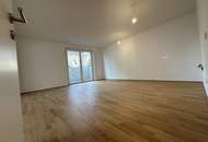 Erstbezug: 3 Zimmer-Mietwohnung mit sonnigen Terrassenflächen und Garten
