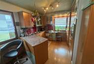 BUNGALOW mit Wintergarten und Garage!