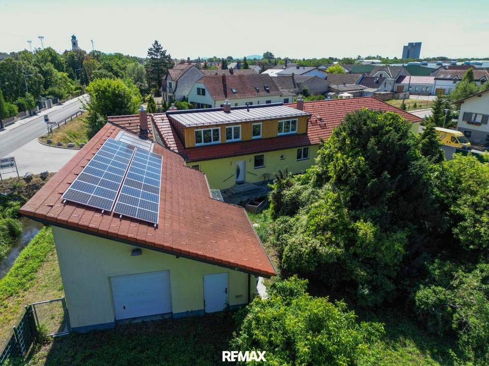 Moderne Gewerbeimmobilie in Untersiebenbrunn mit Garten, Sauna &amp; 2 Garagen zu kaufen!