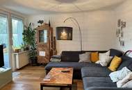 Mauer "Licht. Ruhe. Effizienz. Stilvolle Maisonette mit Südterrasse" | ZELLMANN IMMOBILIEN