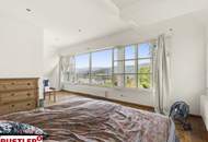 LIEGENSCHAFT IN PÖRTSCHACH MIT BLICK AUF DEN WÖRTHERSEE