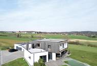 Architektenhaus in sonniger Ruhelage mit Spiral-Weinkeller, Infinity Pool und Burgblick