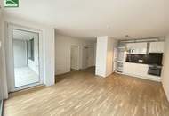 Neuwertige 2-Zimmer-Wohnung mit großer Innenhof-Fensterfront, Balkon und moderner Komplettküche! Nähe Millennium City, Handelskai und Donau. - WOHNTRAUM