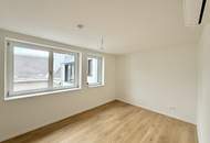 Eleganz trifft Lage – Neubau-Dachgeschosswohnung in Toplage