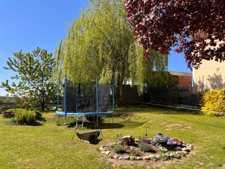 Mehr als nur ein Haus - Platzwunder mit Gartenidylle