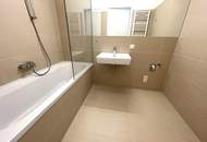 Klimatisierte DG-Wohnung mit hofseitigem Balkon! Baujahr 2021!