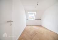 Erstbezug! Elegante 3-Zimmer Dachgeschosswohnung mit Balkon