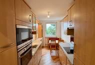 Sanierte Wohnung mit Schrebergarten
