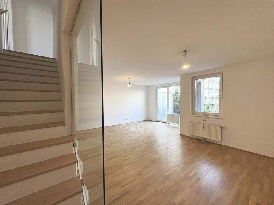 Geförderte Maisonettewohnung - 4 Zimmer mit Garten, Balkon und Loggia