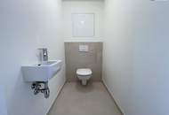 Schnell sein! Charmante Zwei-Zimmer-Wohnung inkl. Garagenplatz mit großem Balkon in Richtung Süden in Ebergassing! Nahe Wien und Flughafen!