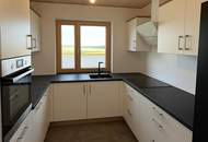 Modernes Plus-Energie-Reihenhaus in Massivholzbauweise