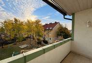 Eigentumswohnung mit ca. 88 m² Wohnfläche, Loggia mit Blick in den Garten und Tiefgaragenstellplatz!